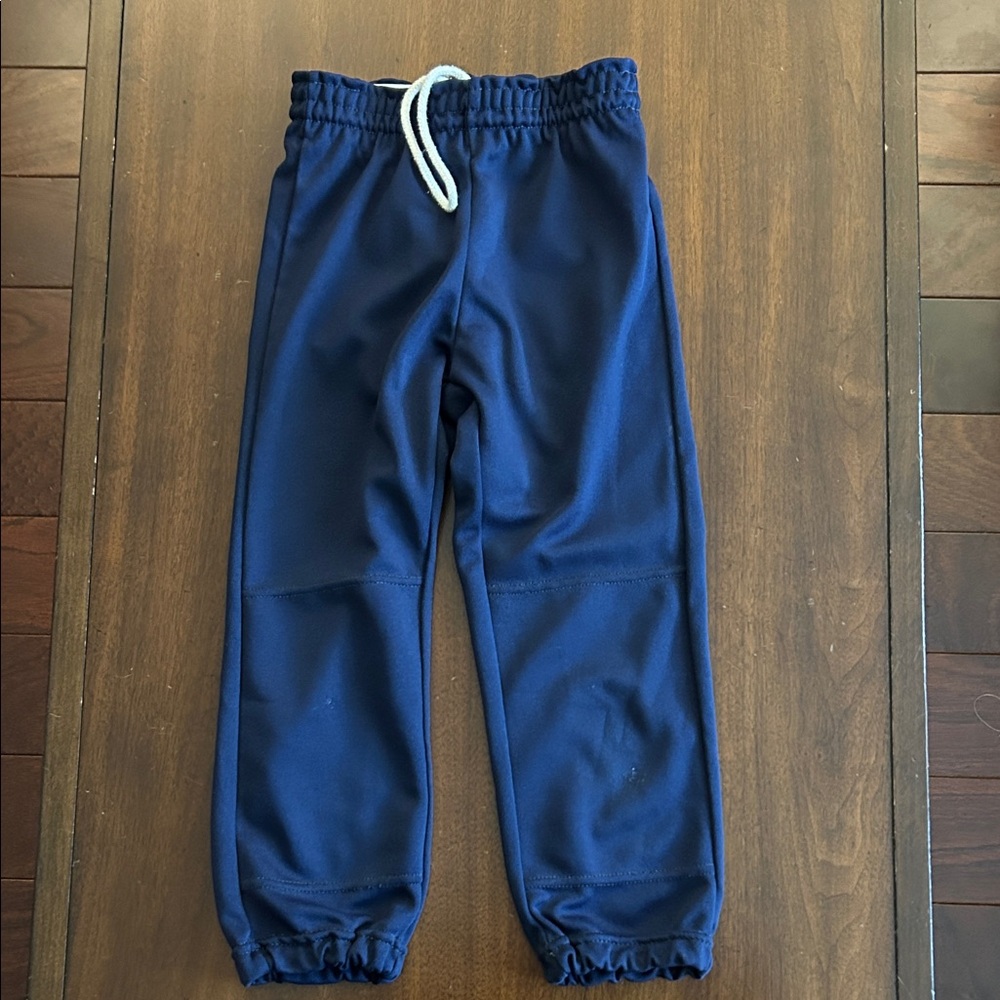 Girls navy softball pants size medium.